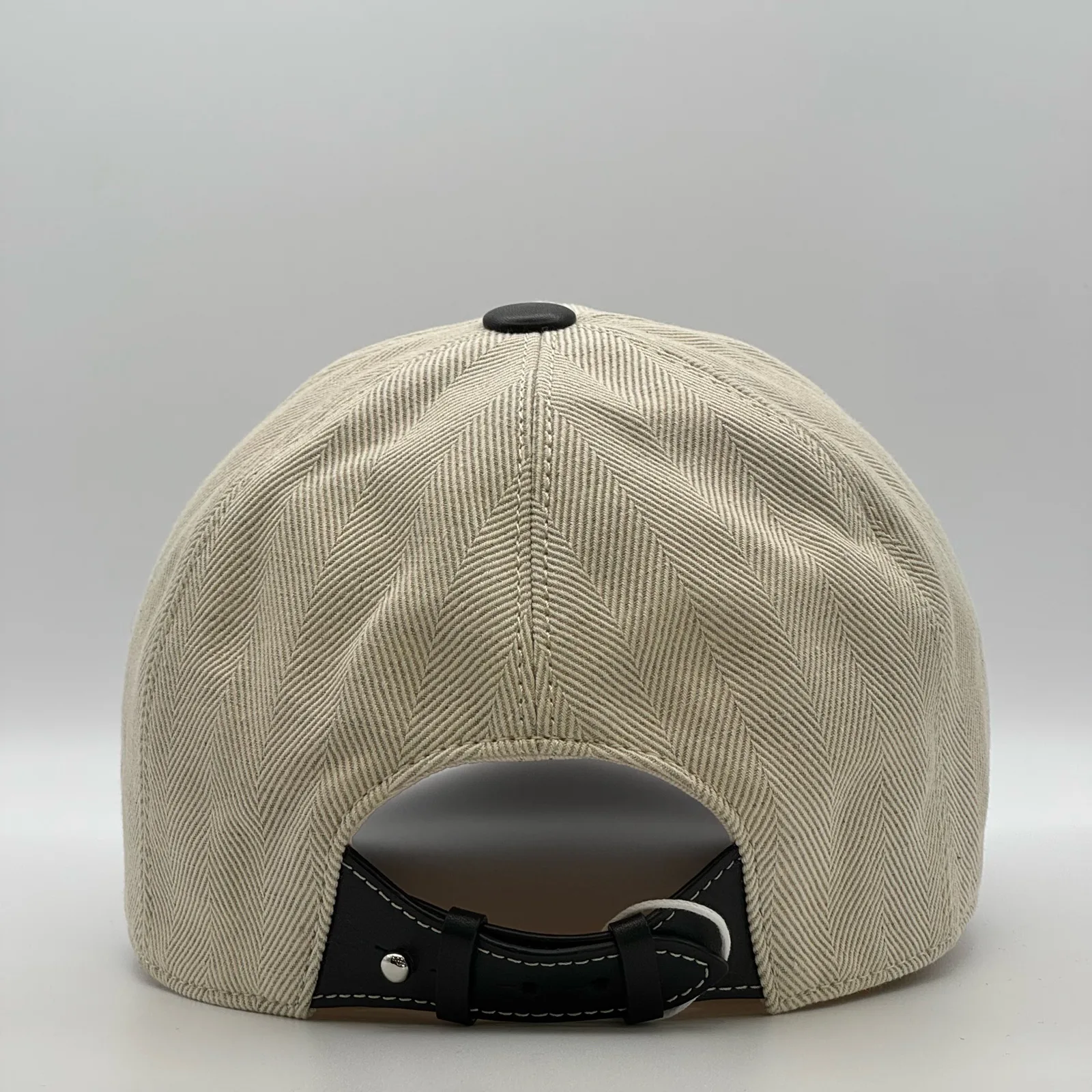 Berluti linen cap, angled rear view showing the six-panel crown construction.