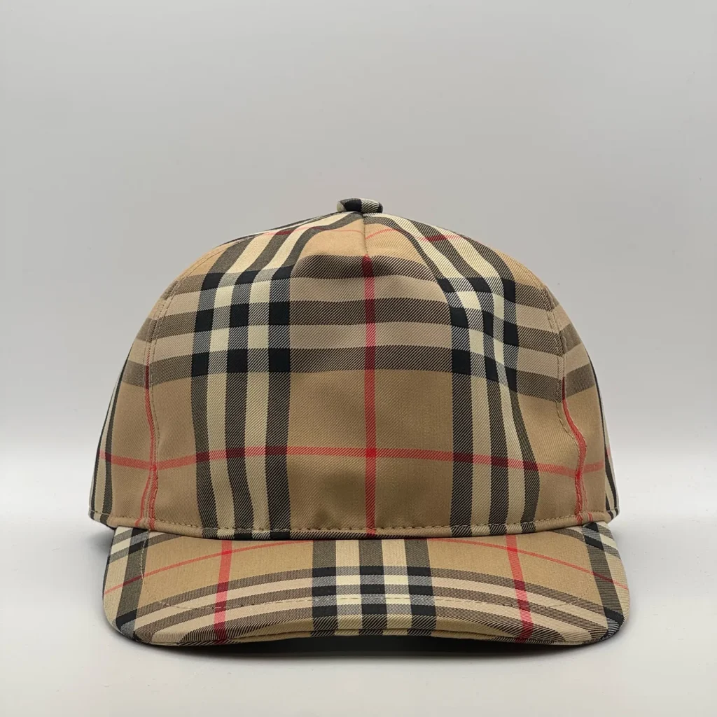 Classic vintage check Burberry cap, three-quarter front-left view.