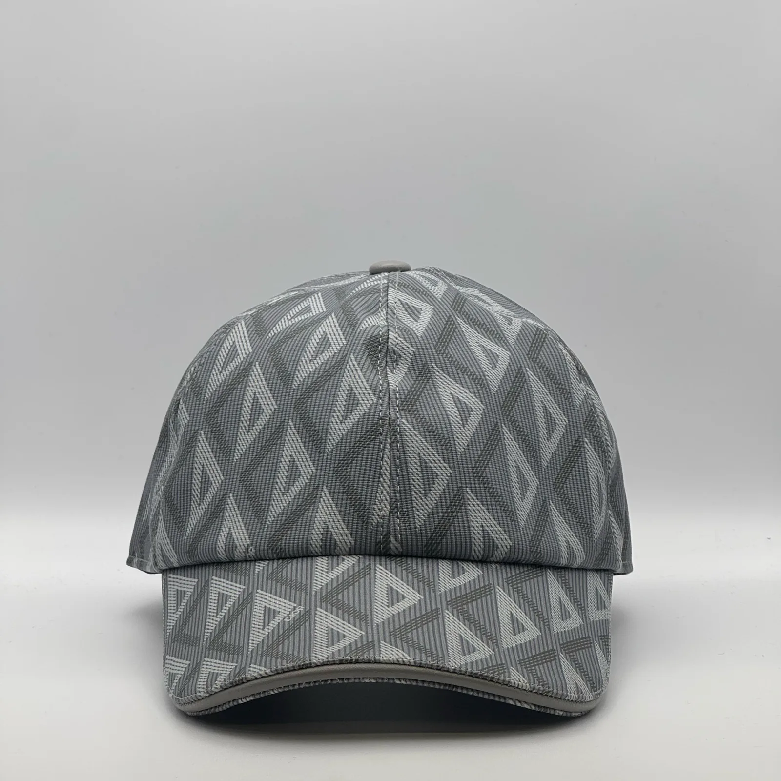 Grey Dior CD Diamond cap, front view showing the geometric jacquard pattern.