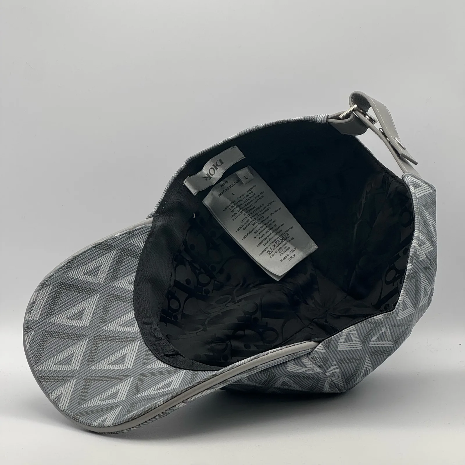 Angled inside view of the grey CD Diamond cap and strap.