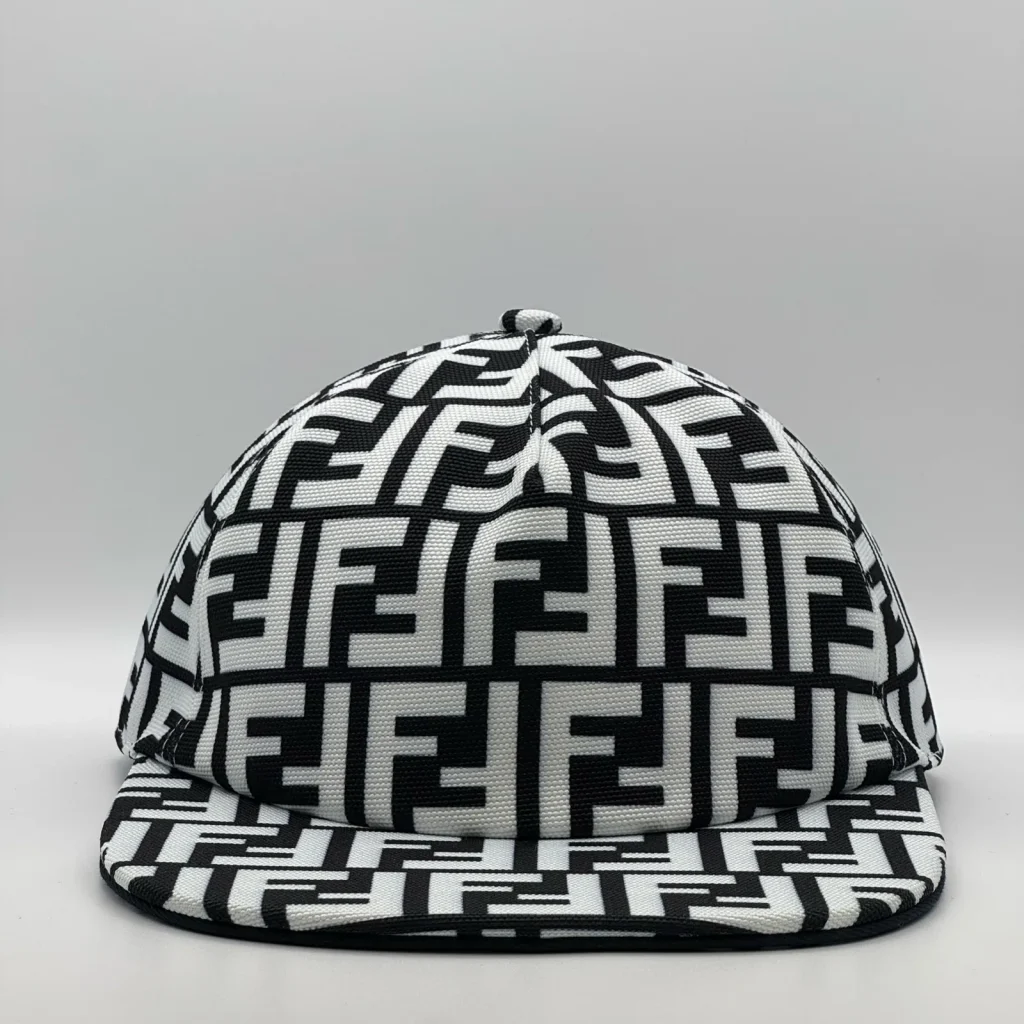 Black and white Fendi FF cap, three-quarter front view.