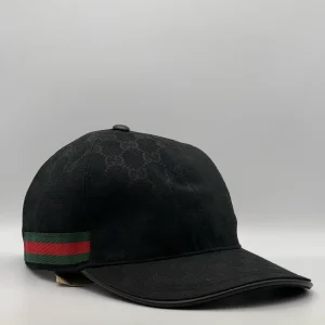 Black GG canvas cap, front three-quarter view with green and red web stripe trim