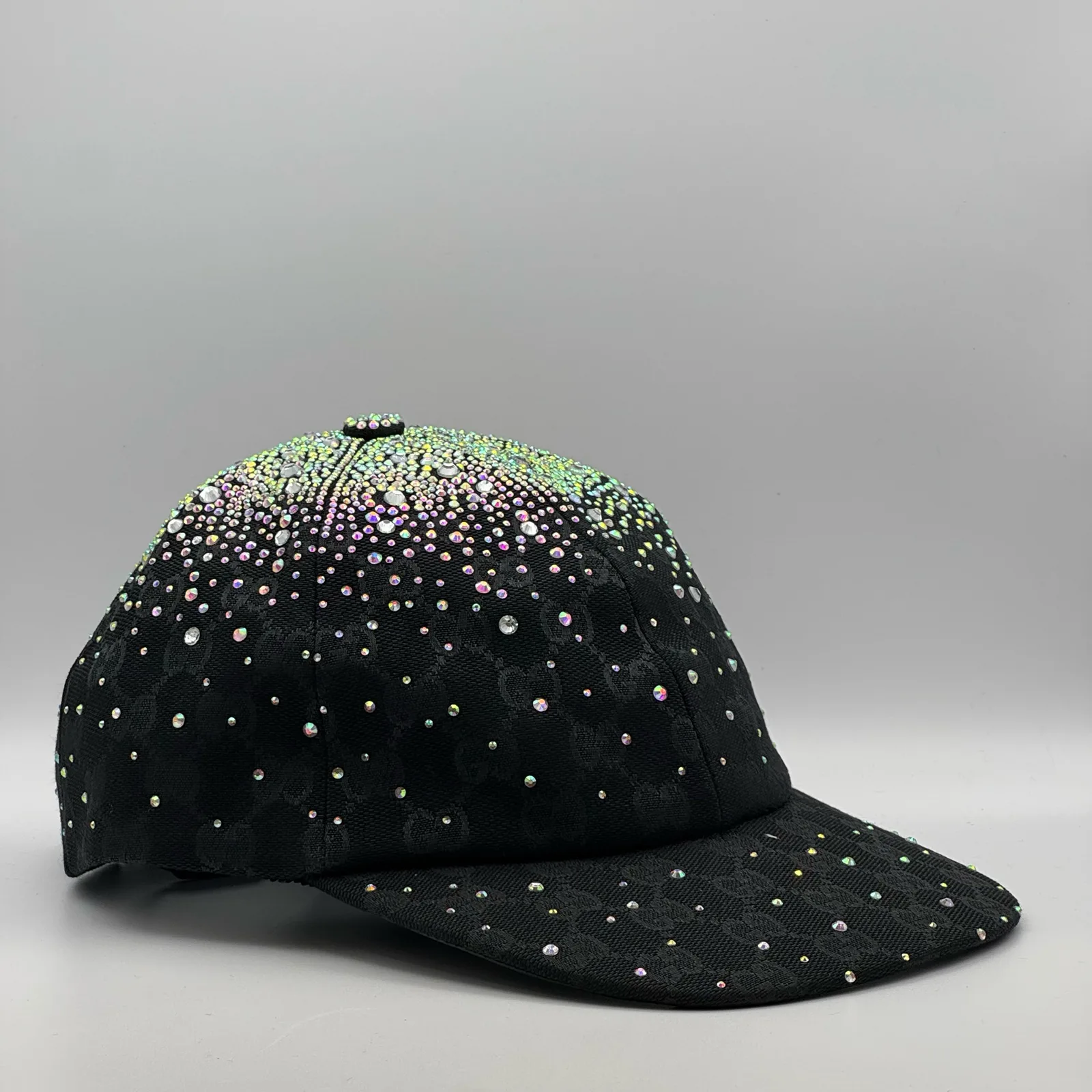 Black crystal-embellished cap, three-quarter view of crystal fade