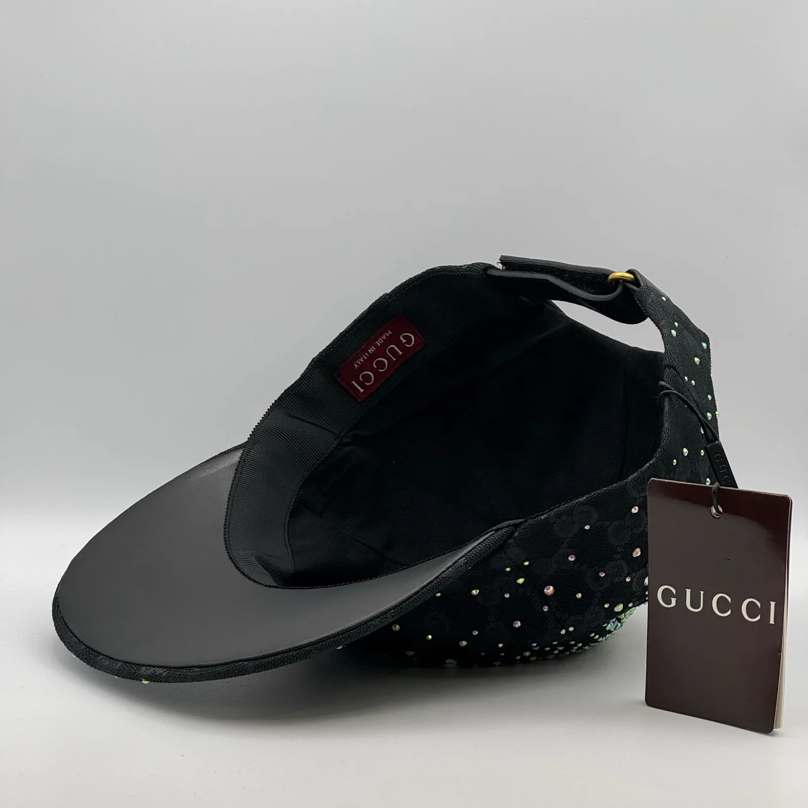 Black crystal cap interior, hang tag and lining view