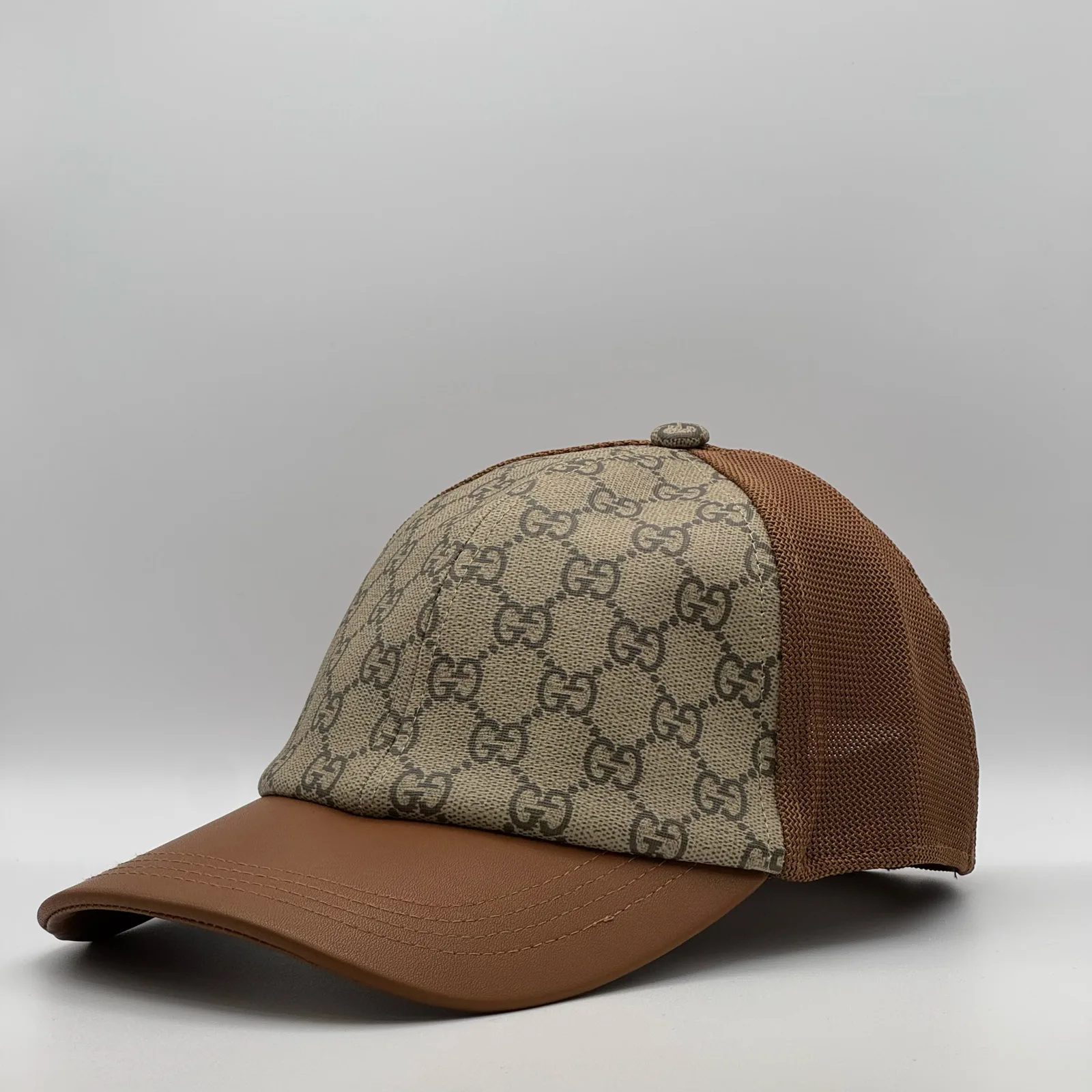 Brown GG trucker cap, side profile view