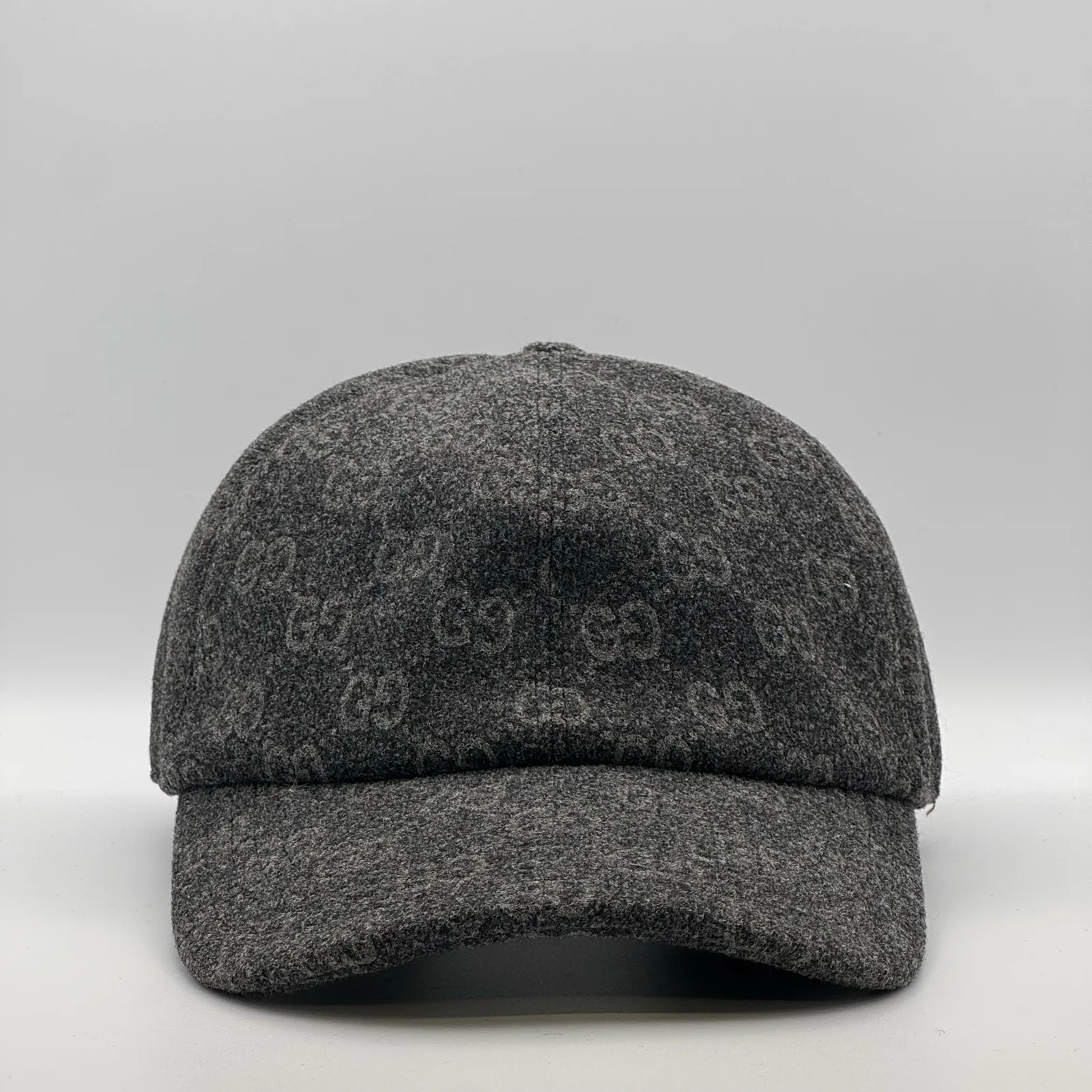 Charcoal GG jacquard wool cap, front view of tonal monogram pattern