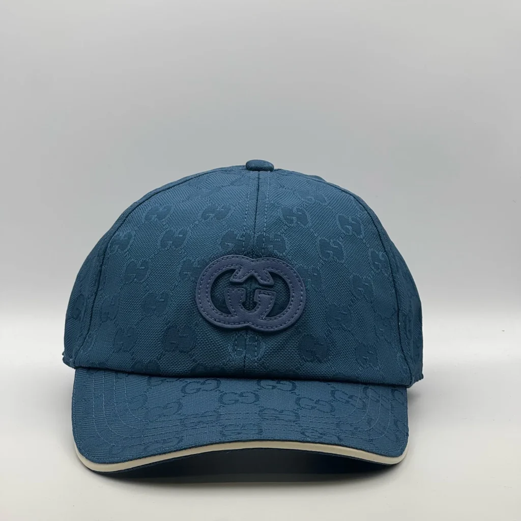 Blue cap with interlocking G logo patch, front view