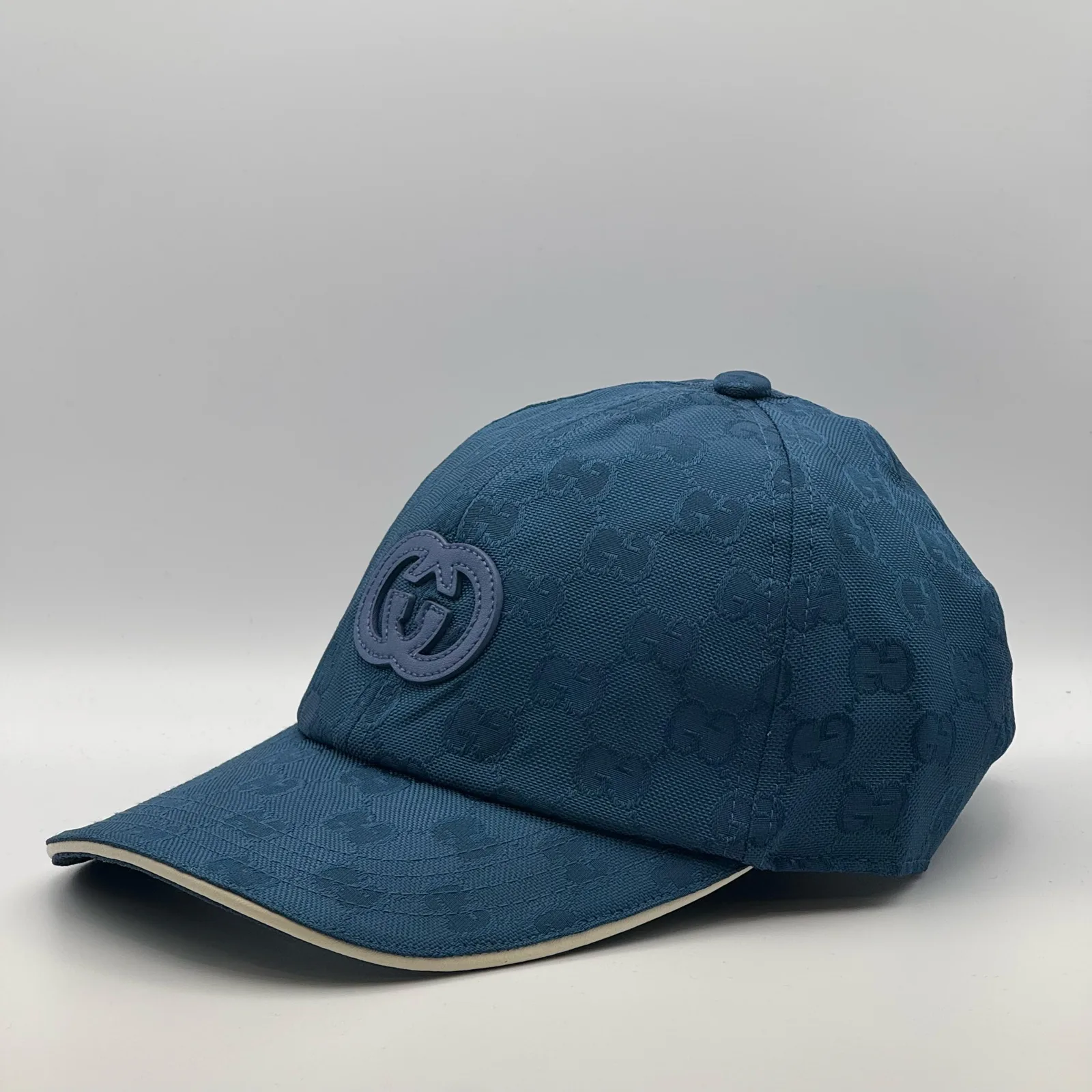 Blue interlocking G cap, side profile view