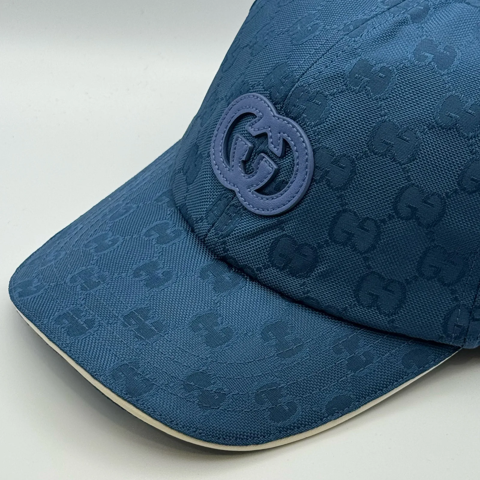 Close-up of interlocking G logo patch on front panel