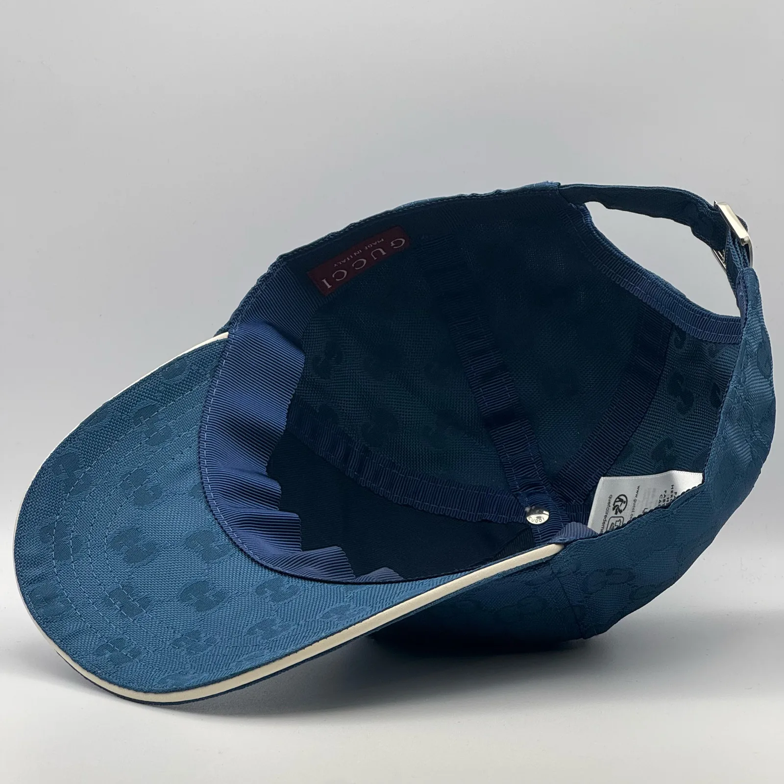 Blue interlocking G cap interior, hang tag and lining
